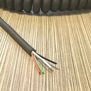 A EC284 - Electronic Coiled Cord 28 Gauge with 4 Conductors - No Shield with two wires on it.