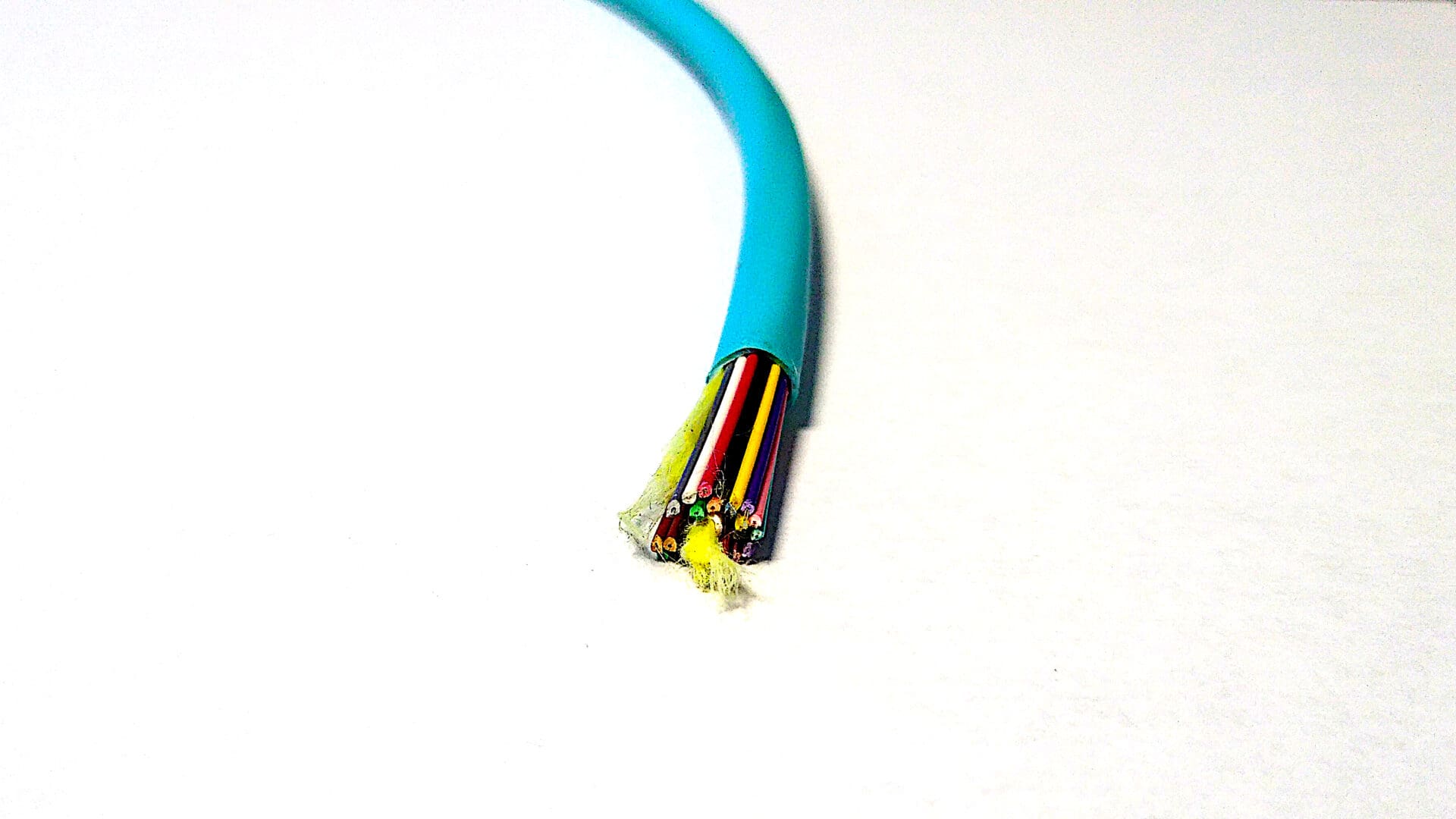 A FiOps300-24F - Aqua Blue cable with a wire attached to it.