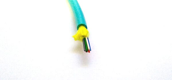A FiOps240-6F - Aqua Blue cable on a white surface.