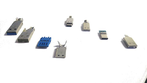 Various types of USB-A to USB-C Connector Combo connectors on a white surface.