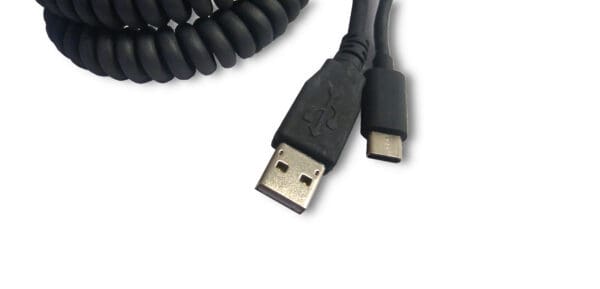 A black coiled USB-A to USB-C Connector Combo (Connectors Only) cable connected to a device.