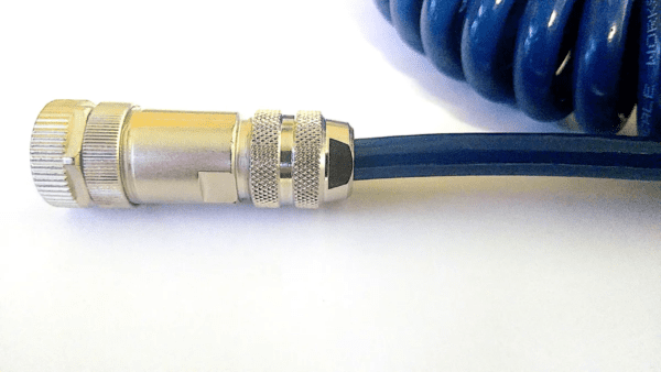Close-up of a blue coiled cable connected to a silver M12-5 connector on a white background.