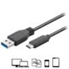 A USB 3.2 Male-A to Male-C Coil Cord - SS 10GBPS with different devices connected to it.