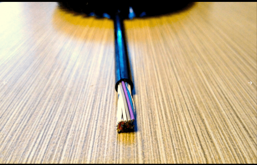 Cut black cable with exposed colored wires